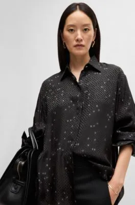 Blusa holgada con estampado y jacquard de puntos