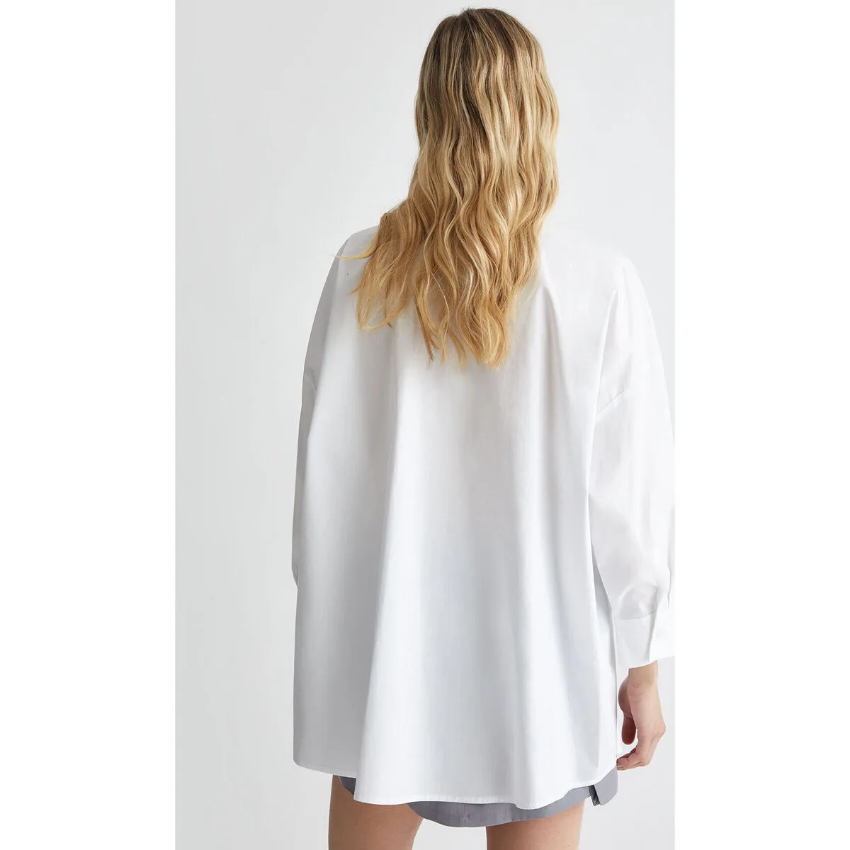 Camisa holgada con lazo