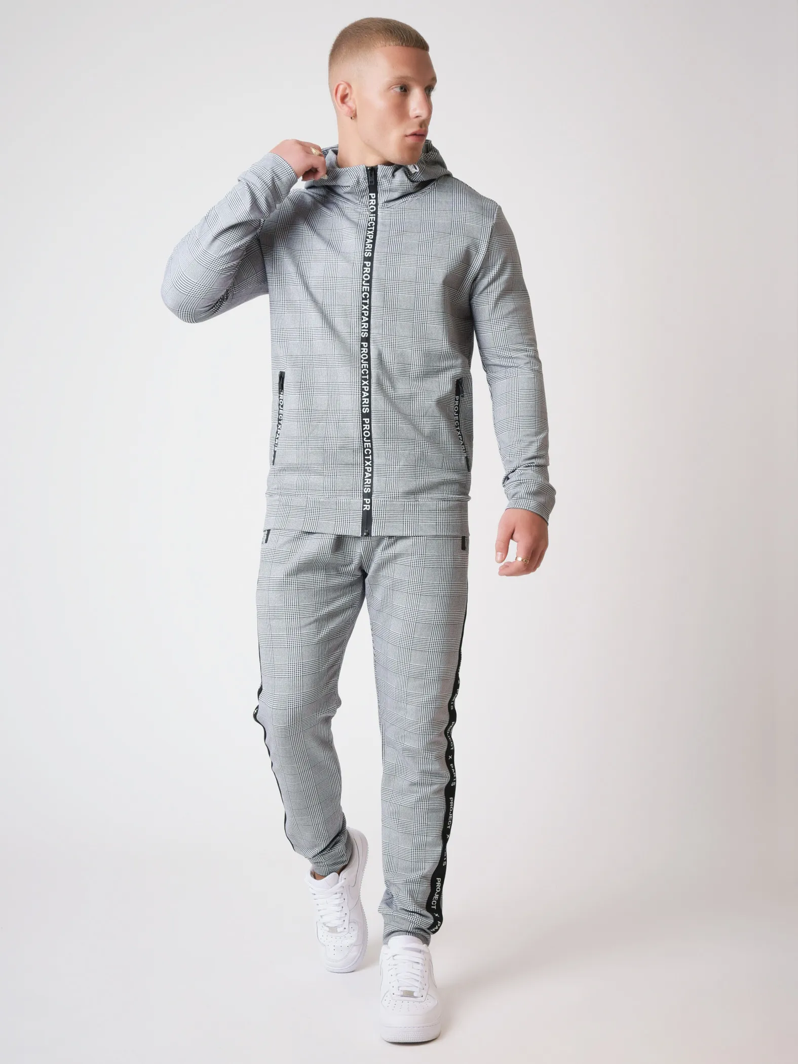 Chaqueta con estampado de cuadros y cremallera con logotipo