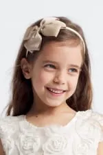 Diadema con lazo beige
