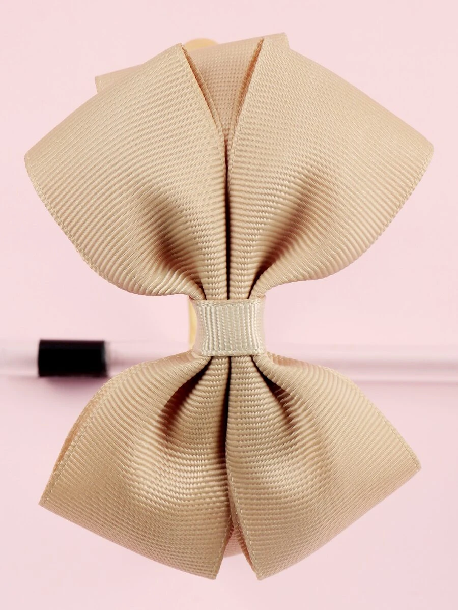Diadema con lazo beige