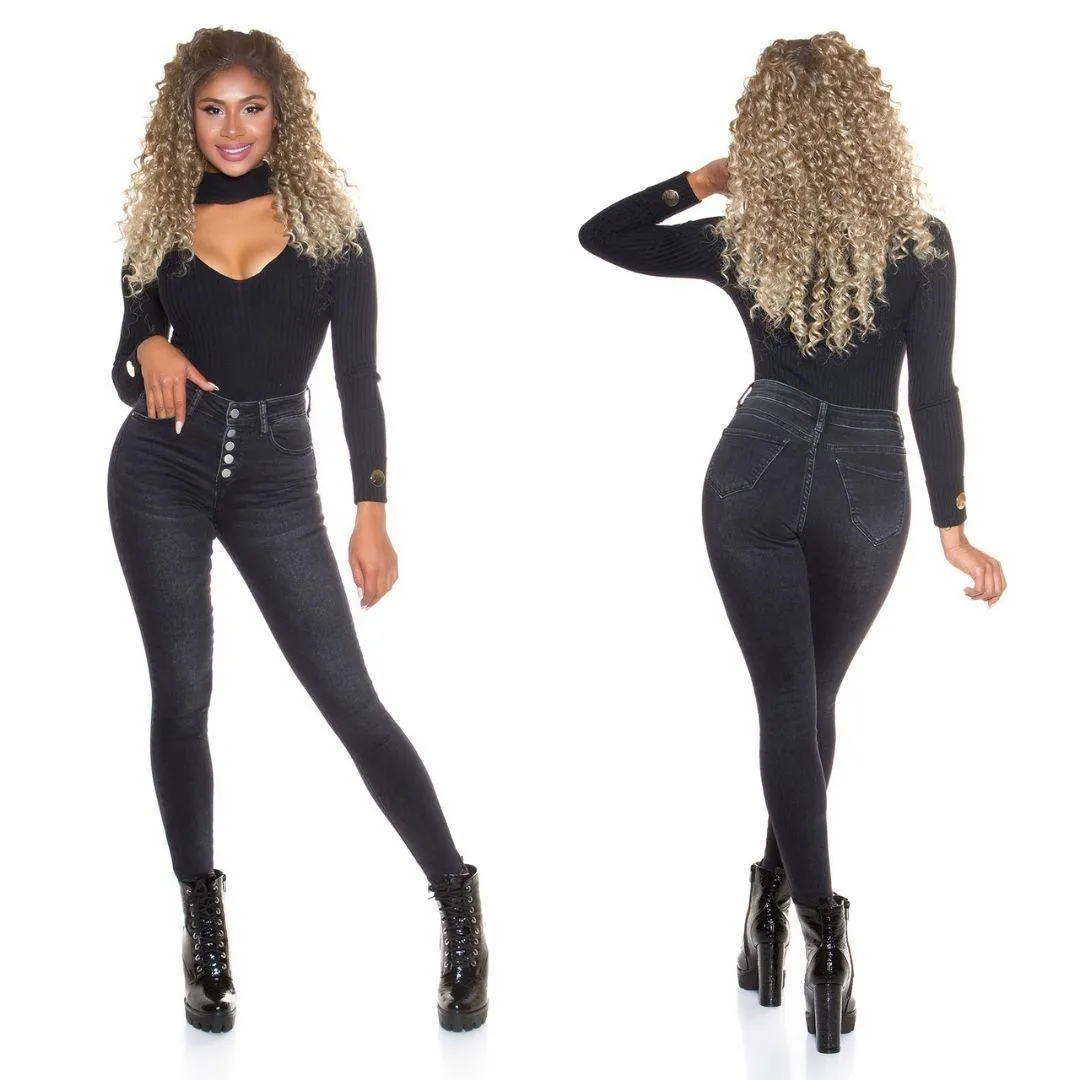 Jeans ajustados con botones negro