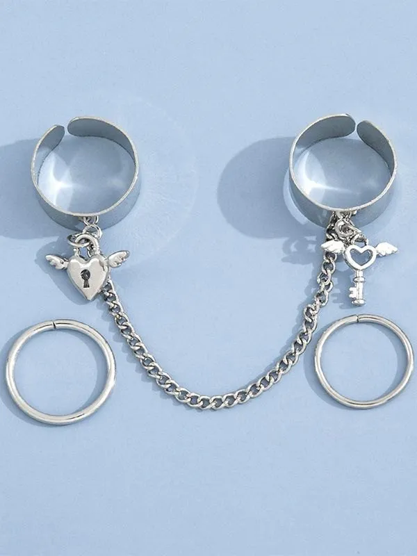 Juego de anillos de puño con colgante de llave de corazón