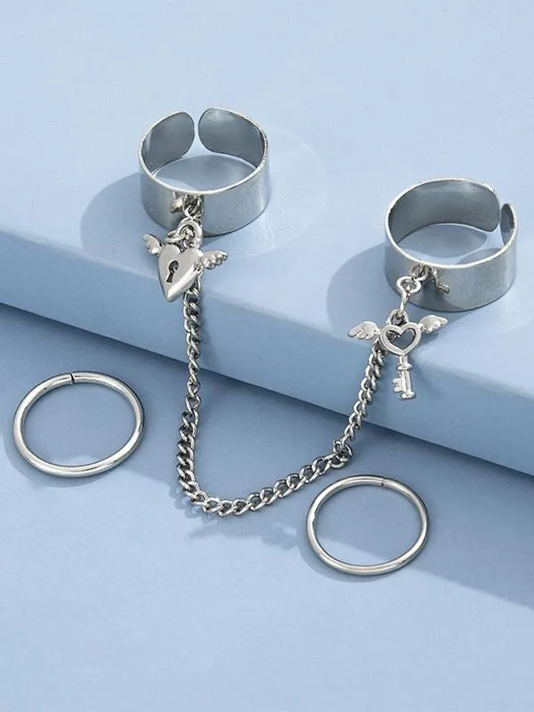 Juego de anillos de puño con colgante de llave de corazón