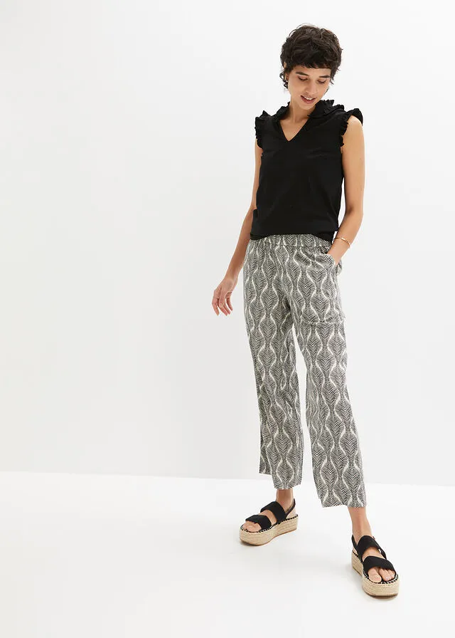 PANTALóN CON CINTURILLA ELáSTICA NEGROBEIGE ARENA CON ESTAMPADO GRáFICO