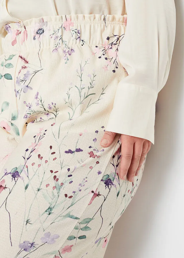 Pantalón de punto de crepé con estampado de flores Beige natural de flores