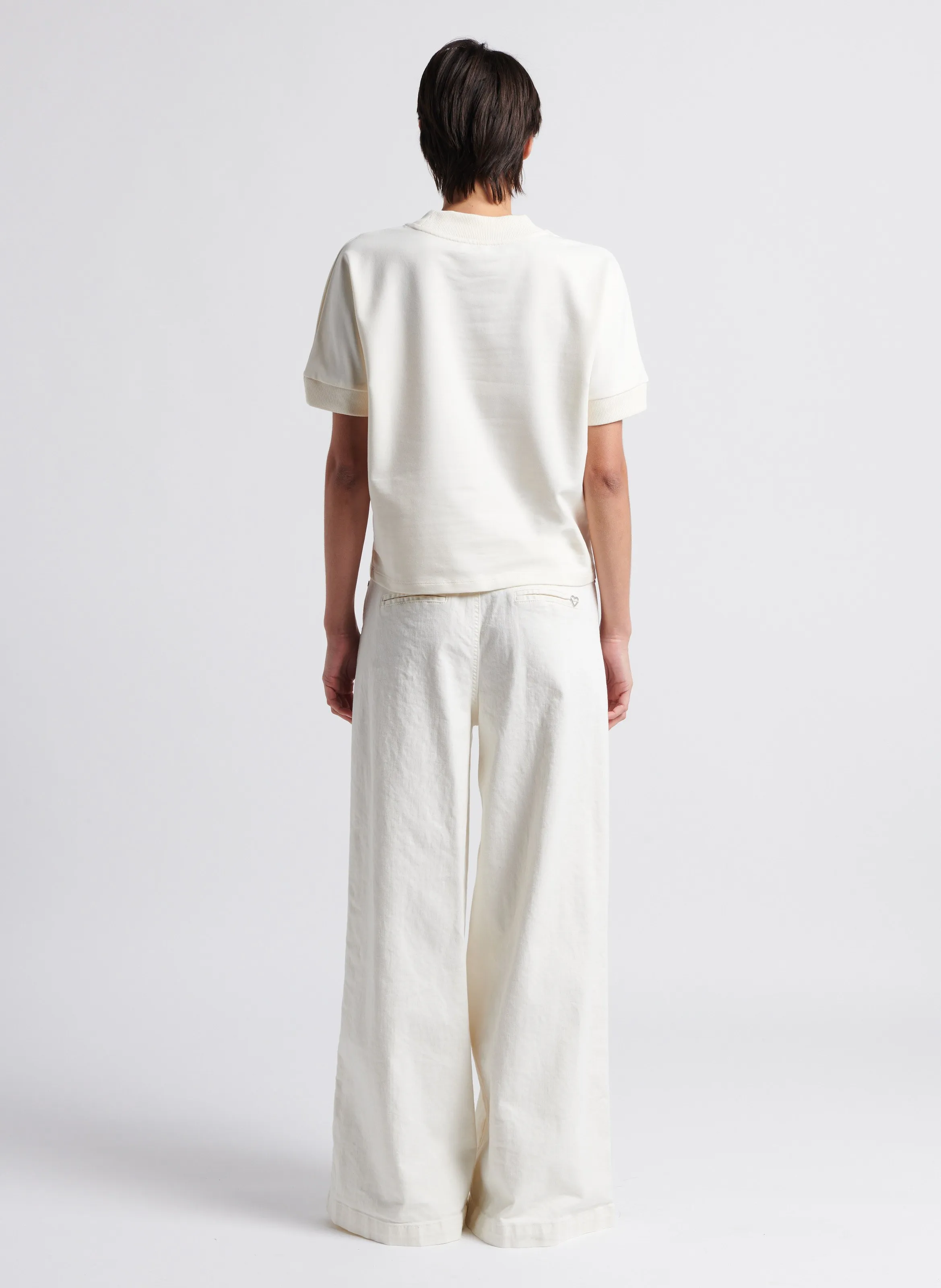 PLEASE Vaquero bootcut de mezcla de algodón de tiro alto en blanco