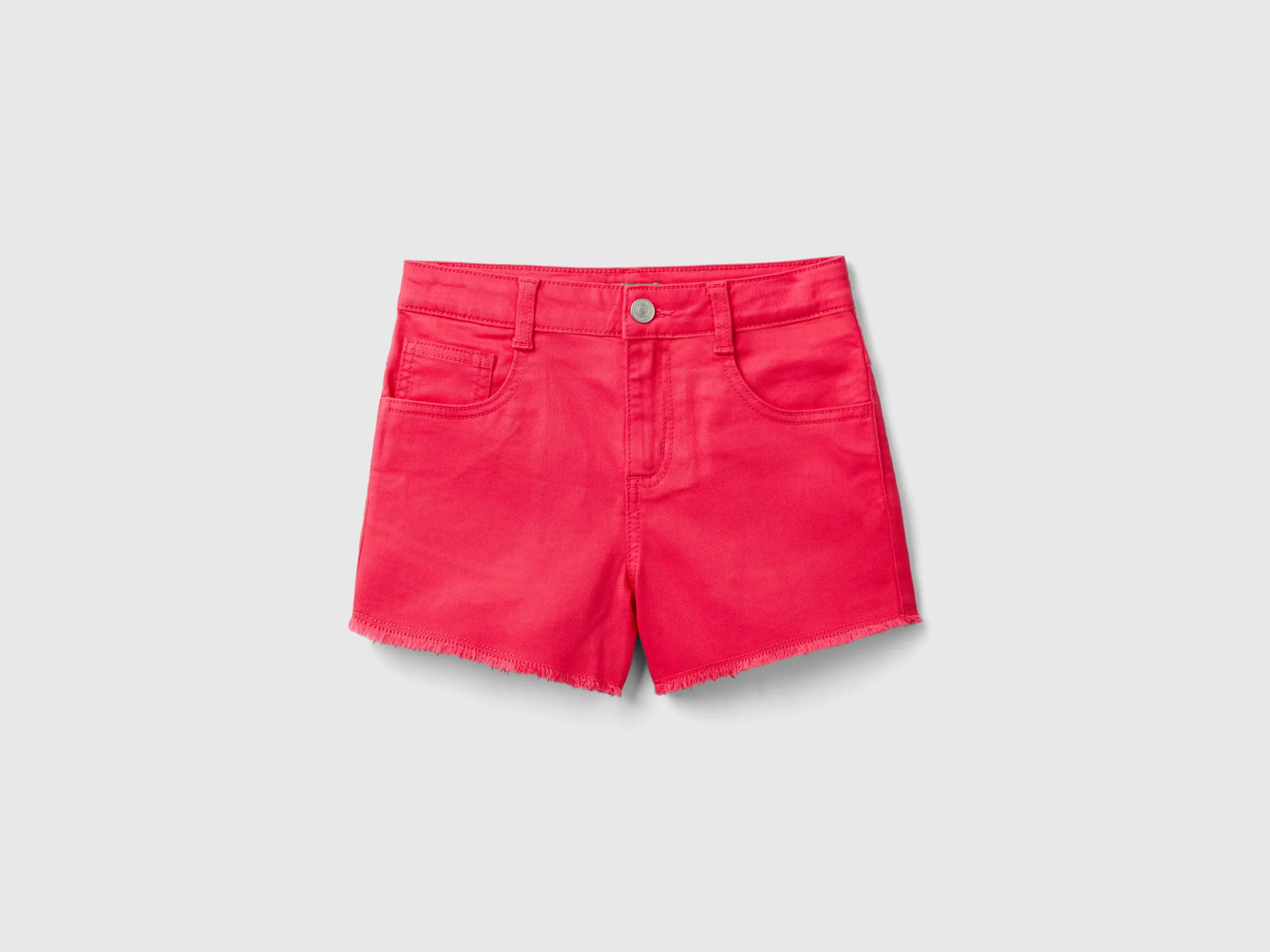 Shorts deshilachados de algodón elástico