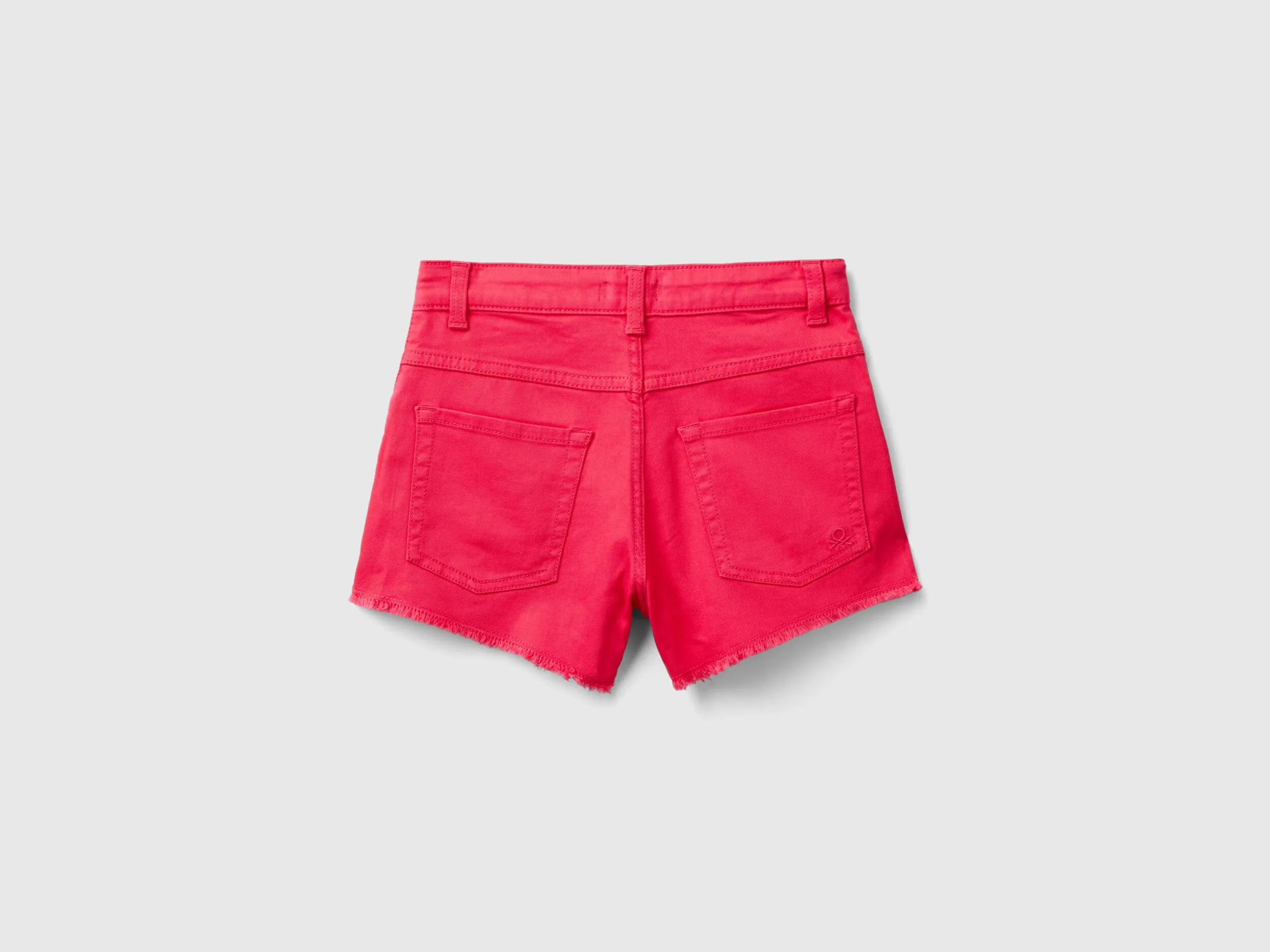 Shorts deshilachados de algodón elástico