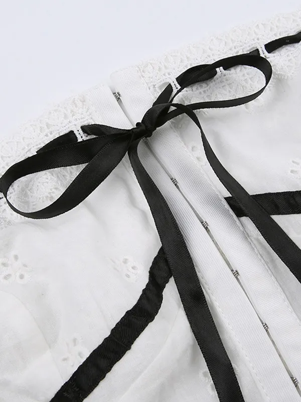 Top bandeau de encaje bordado con lazo