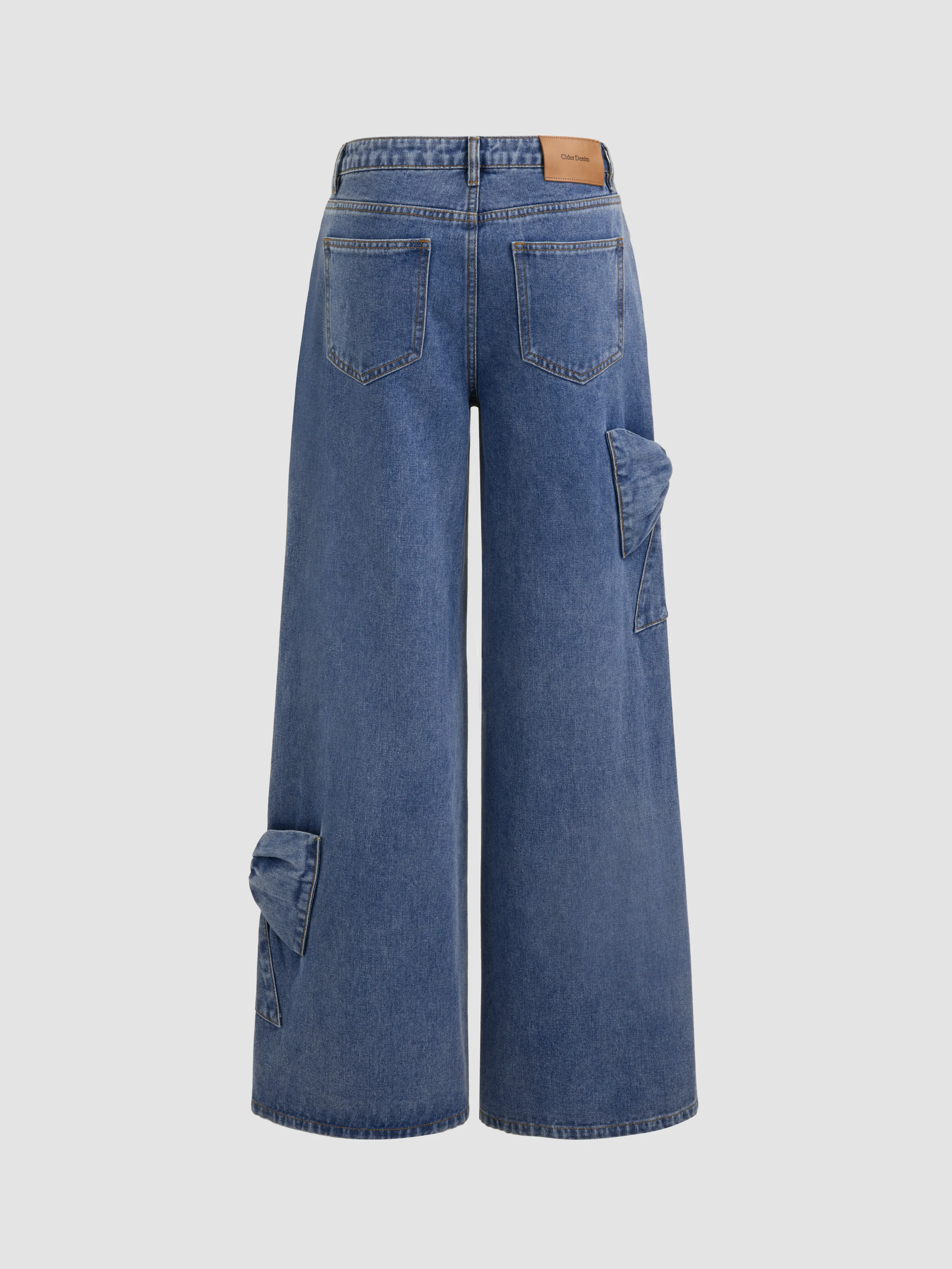 Vaqueros denim de tiro bajo con lazo y pata ancha