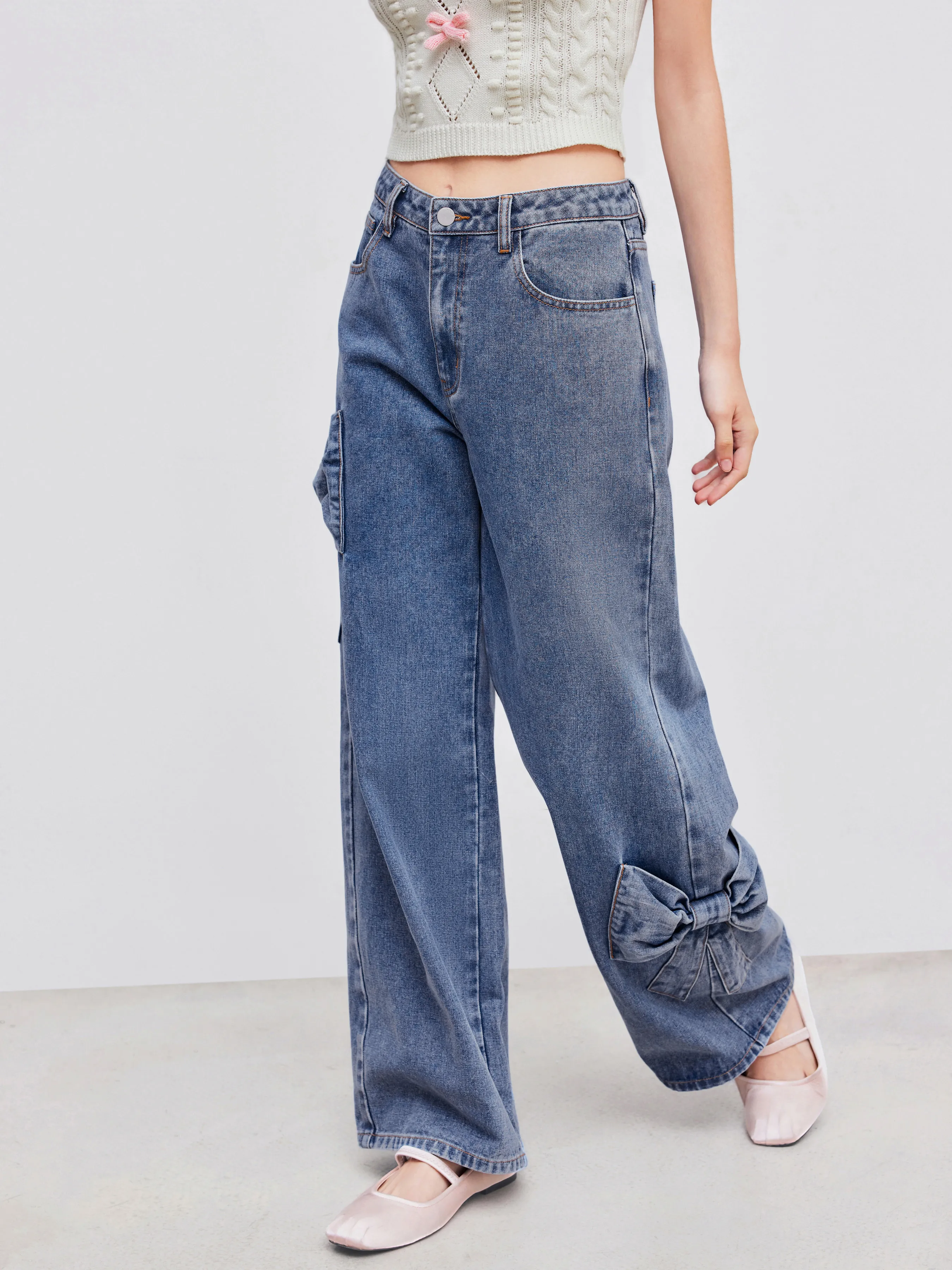 Vaqueros denim de tiro bajo con lazo y pata ancha