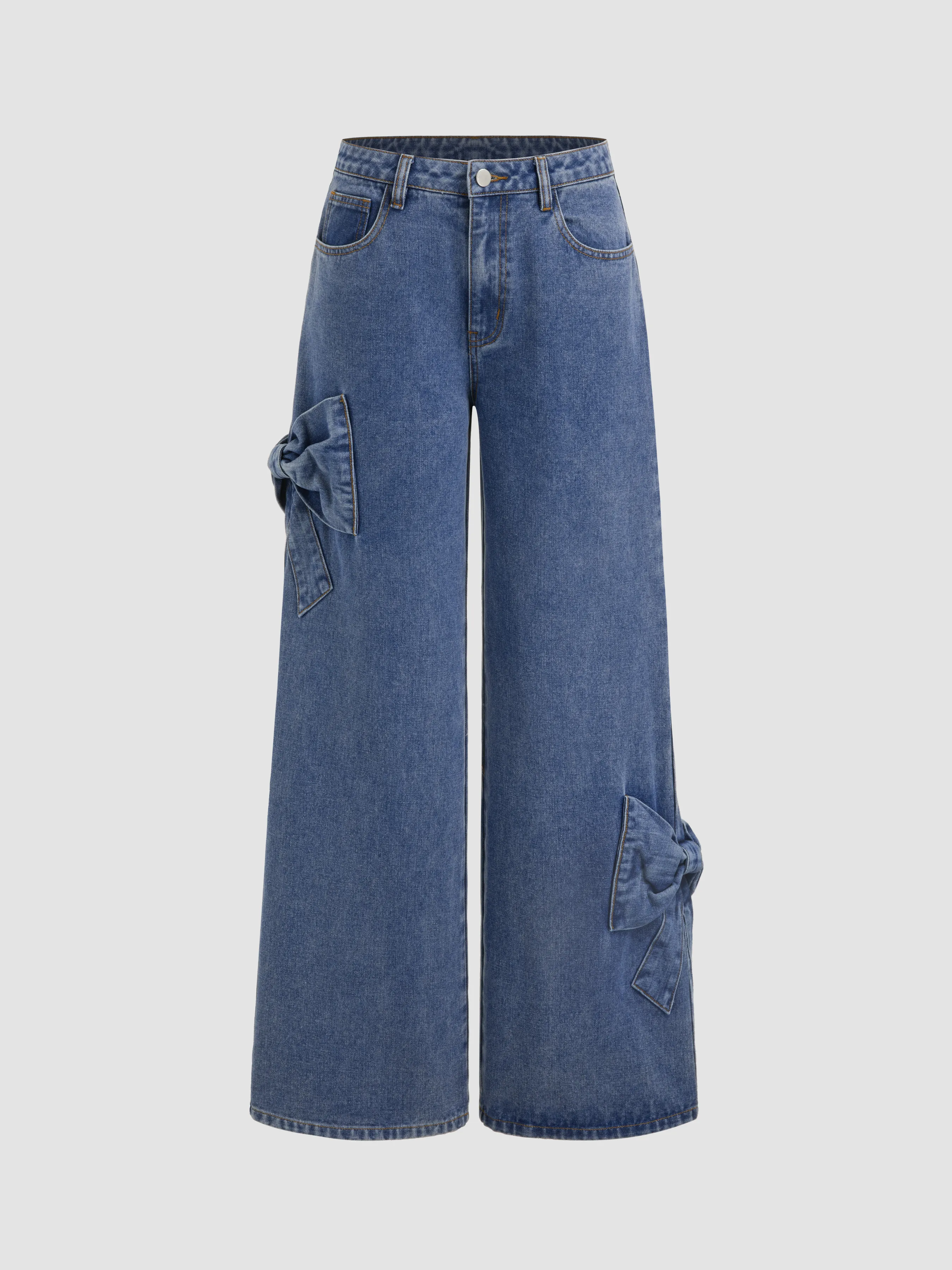 Vaqueros denim de tiro bajo con lazo y pata ancha