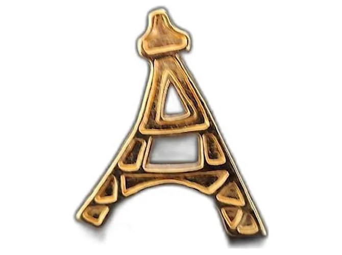 Yves Saint Laurent Alfileres y broches Dorado 