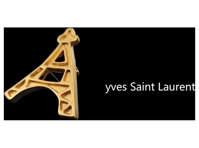 Yves Saint Laurent Alfileres y broches Dorado 