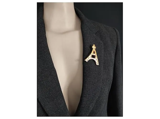 Yves Saint Laurent Alfileres y broches Dorado 